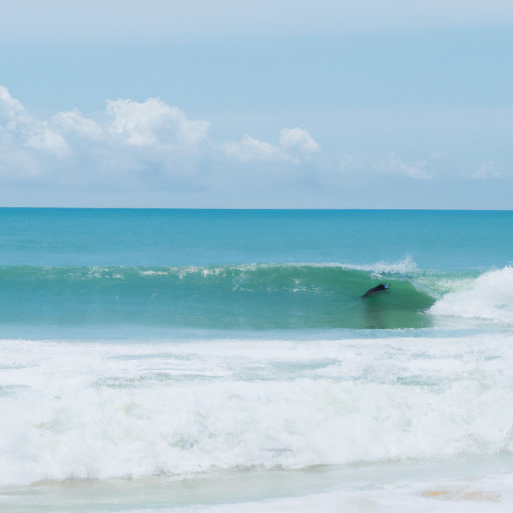 Surfing in Praia de Regência