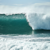 Surfing in Pollock Beach