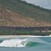 Surfing in Ekas Bay