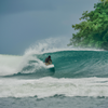 Surfing in Lagundri Bay