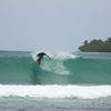 Surfing in Sorake Beach