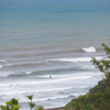 Surfing in Diguisit Beach