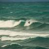 Surfing in Darigayos Beach