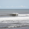 Surfing in Urbiztondo Beach