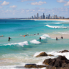 Surfing in Rainbow Bay