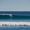 Surfing in Boomer Beach