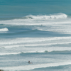 Surfing in Moana Beach