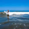 Surfing in Tortuguero Beach