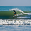 Surfing in Los Perros Point
