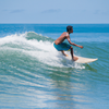 Surfing in Playa Serena