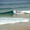 Surfing in Playa de Verdicio
