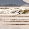 Surfing in Cox Bay