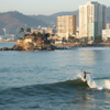 Surfing in Playa Bonfil