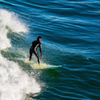 Surfing in Oceanside Pier