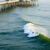 Surfing in Huntington Beach Pier
