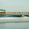 Surfing in Cocoa Beach Pier