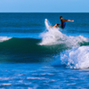 Surfing in New Smyrna Beach Inlet