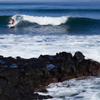 Surfing in Magic Sands Beach