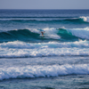 Surfing in Kekaha Beach Park