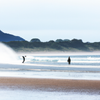 Surfing in Agate Beach