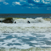 Surfing in Litchfield Beach