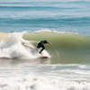 Surfing in Praia de Camburi