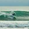 Surfing in Pelicano