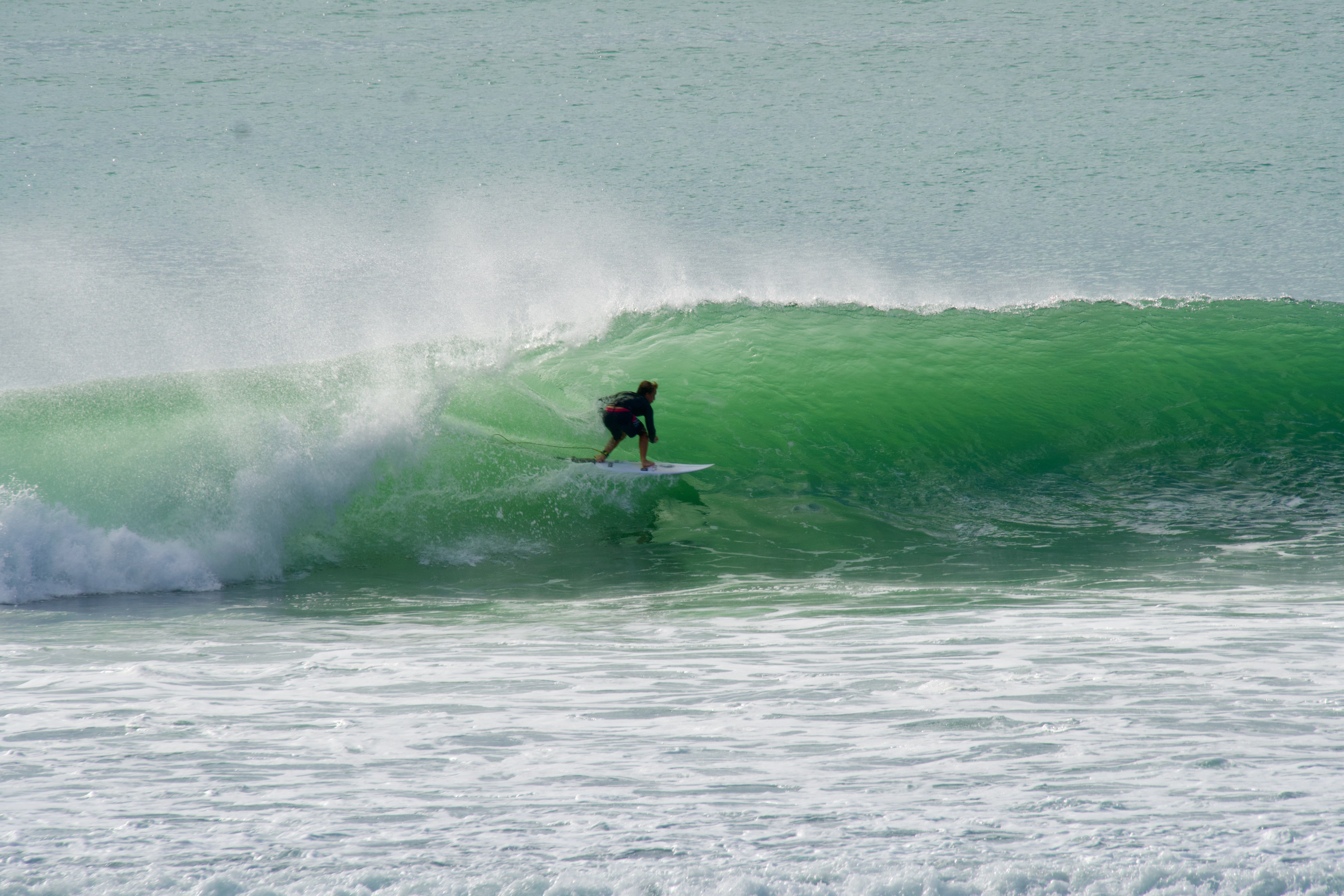 Surfing in Uluwatu, Bali